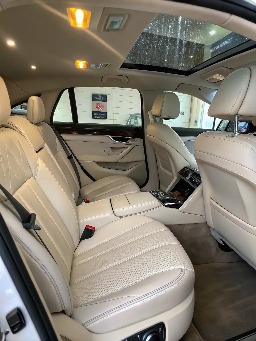 A close-up shot of a car's interior being thoroughly cleaned, focusing on the attention to detail in cleaning upholstery and dashboard.